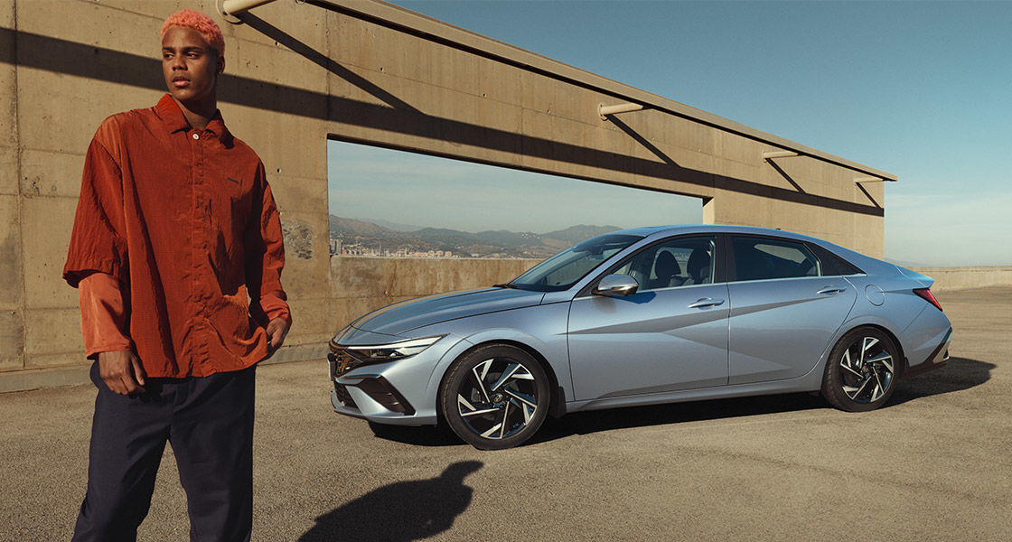 Closer view at the front part of Hyundai car with its logo and grille