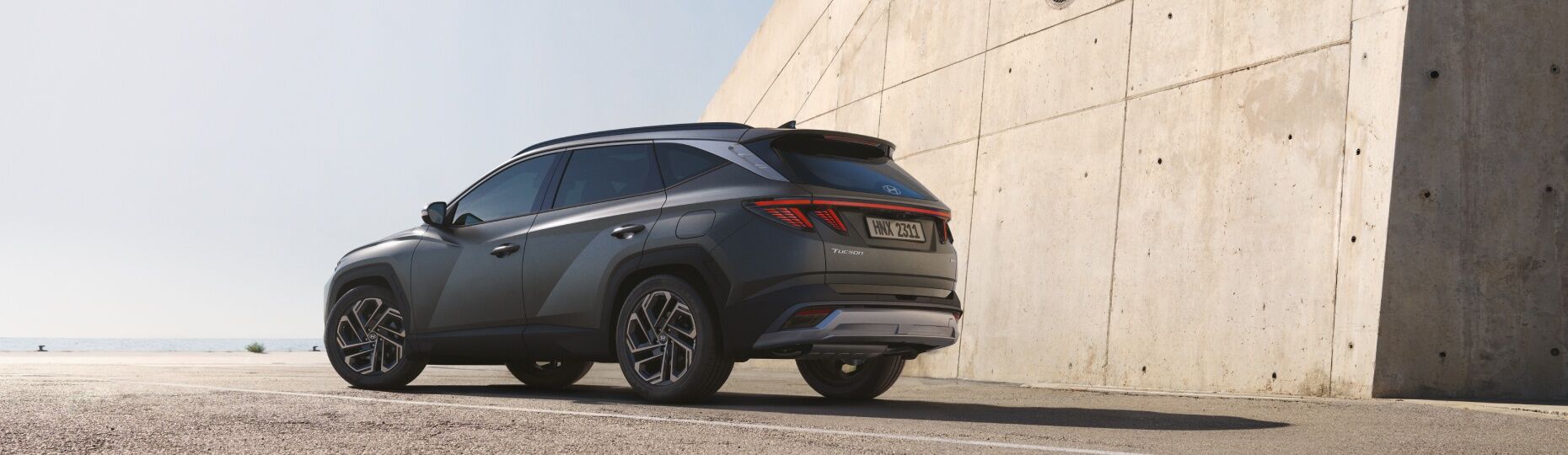 Closer view at the front part of Hyundai car with its logo and grille