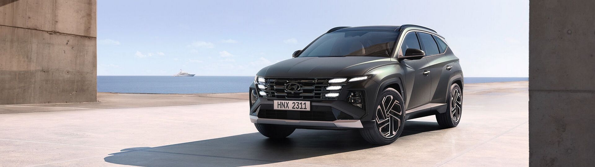 Closer view at the front part of Hyundai car with its logo and grille