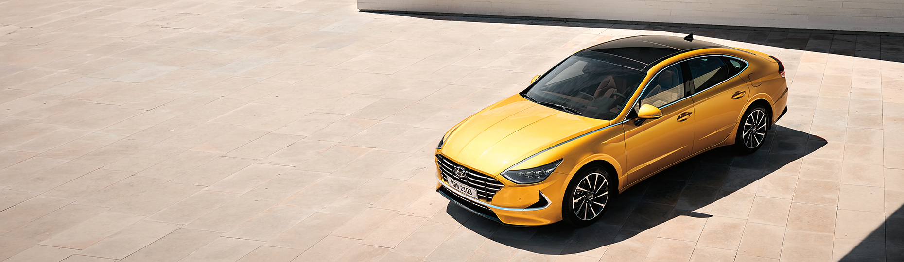 Closer view at the front part of Hyundai car with its logo and grille