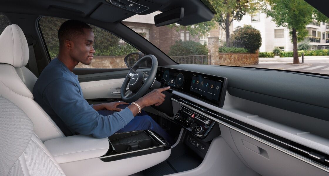 Closer view at the front part of Hyundai car with its logo and grille